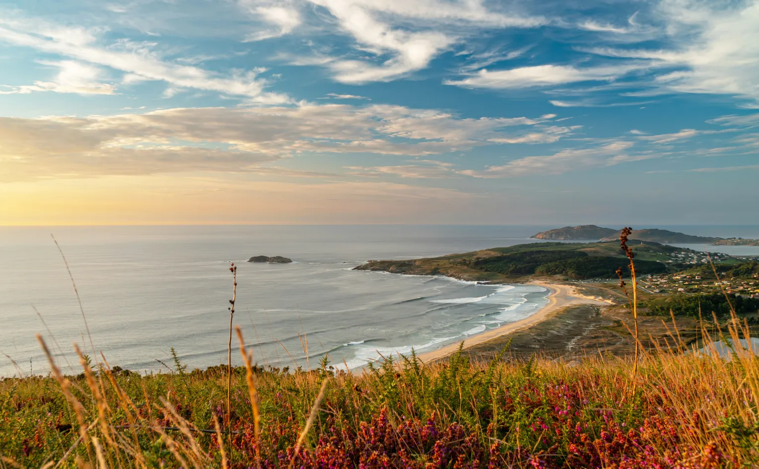 Golden sunset at Doniños Beach viewed from Monte Ventoso